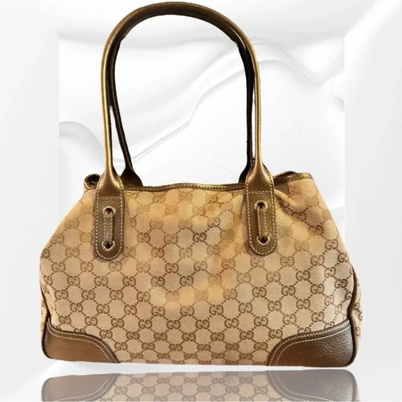 AUTHENTIC GUCCI GOLD ORIGINAL GG CANVAS PRINCY TOTE.